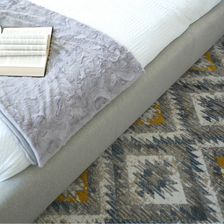 Soft and inviting area rugs adding comfort to bedrooms.